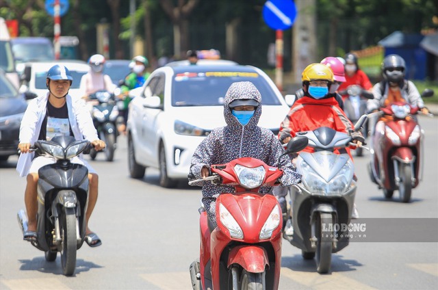 Nắng nóng gay gắt gia tăng ở Bắc Bộ và Trung Bộ - Ảnh 1.